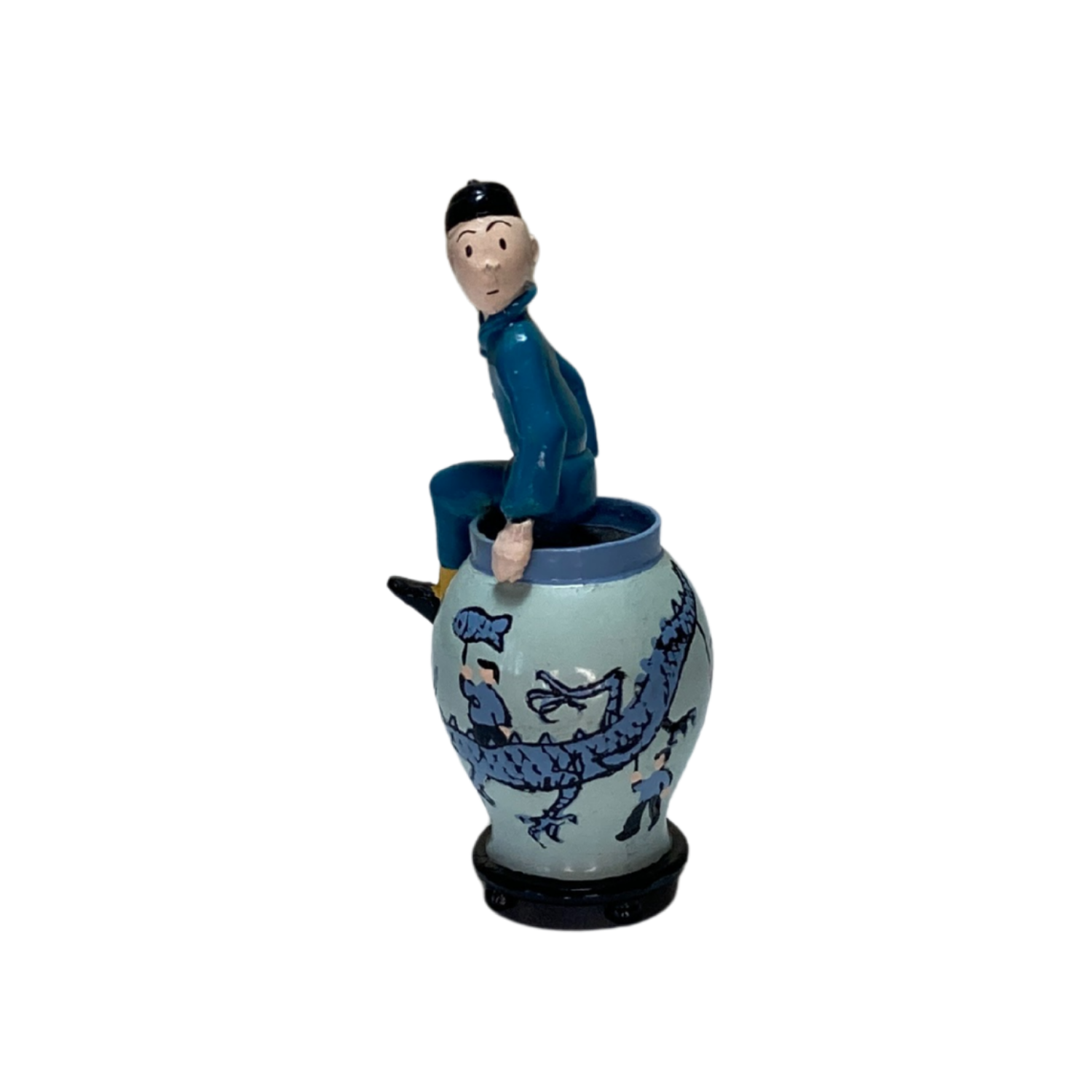 Figurine de Tintin sortant de la potiche, détail coloré et réaliste, fabriquée par Espace714, visible de face dans cette image.
