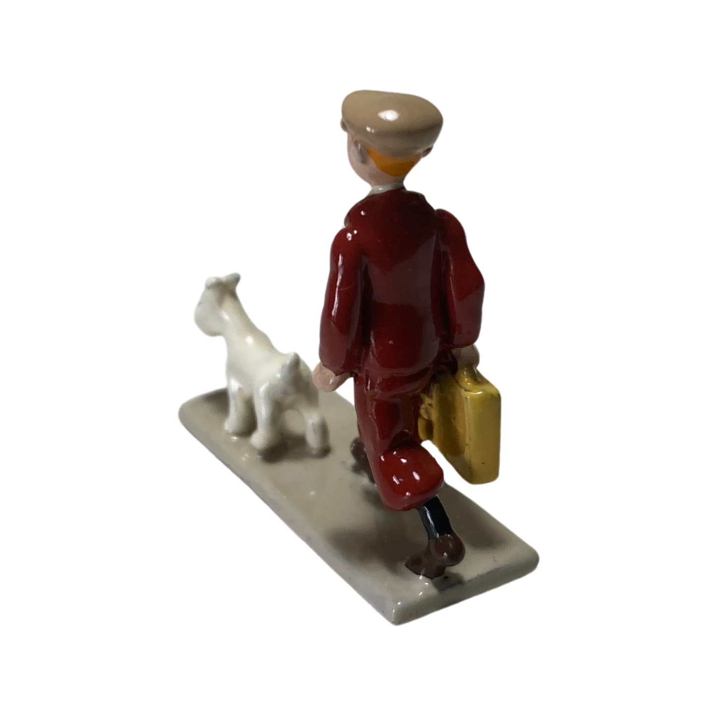 Valise Tintin Espace714 avec illustration de Tintin sur la surface, poignée et roulettes visibles sur l'image.