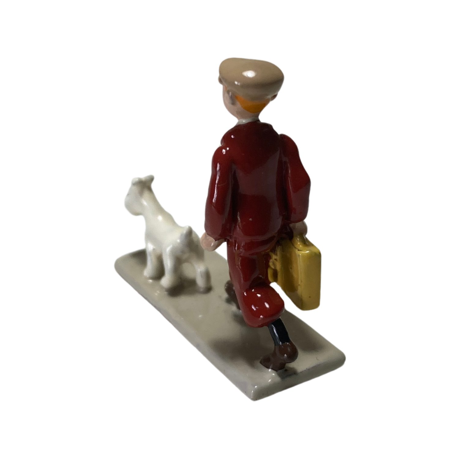 Valise Tintin Espace714 avec illustration de Tintin sur la surface, poignée et roulettes visibles sur l'image.