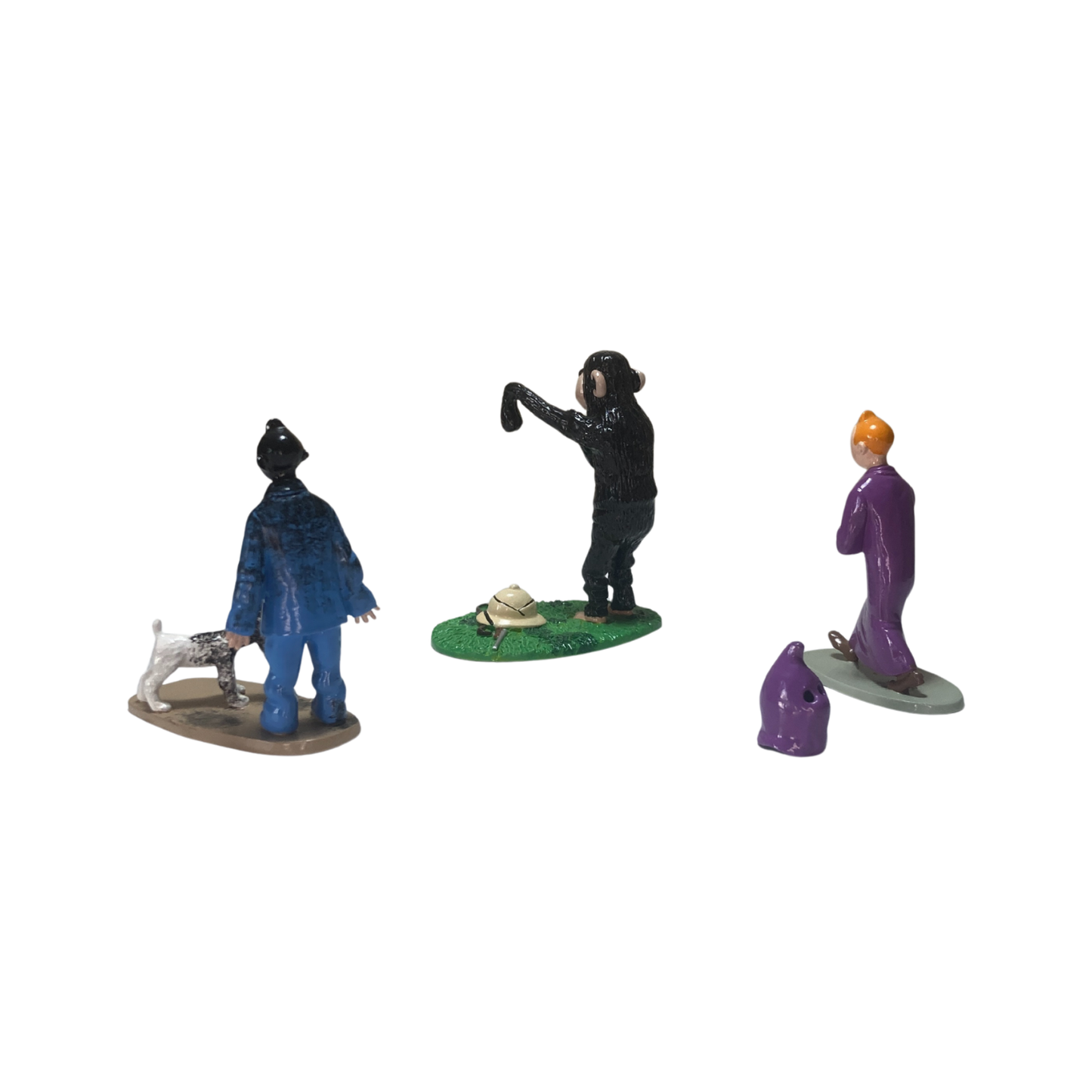 Trio Tintin de Espace714, ensemble de trois figurines ou objets décoratifs inspirés de Tintin, en couleur.