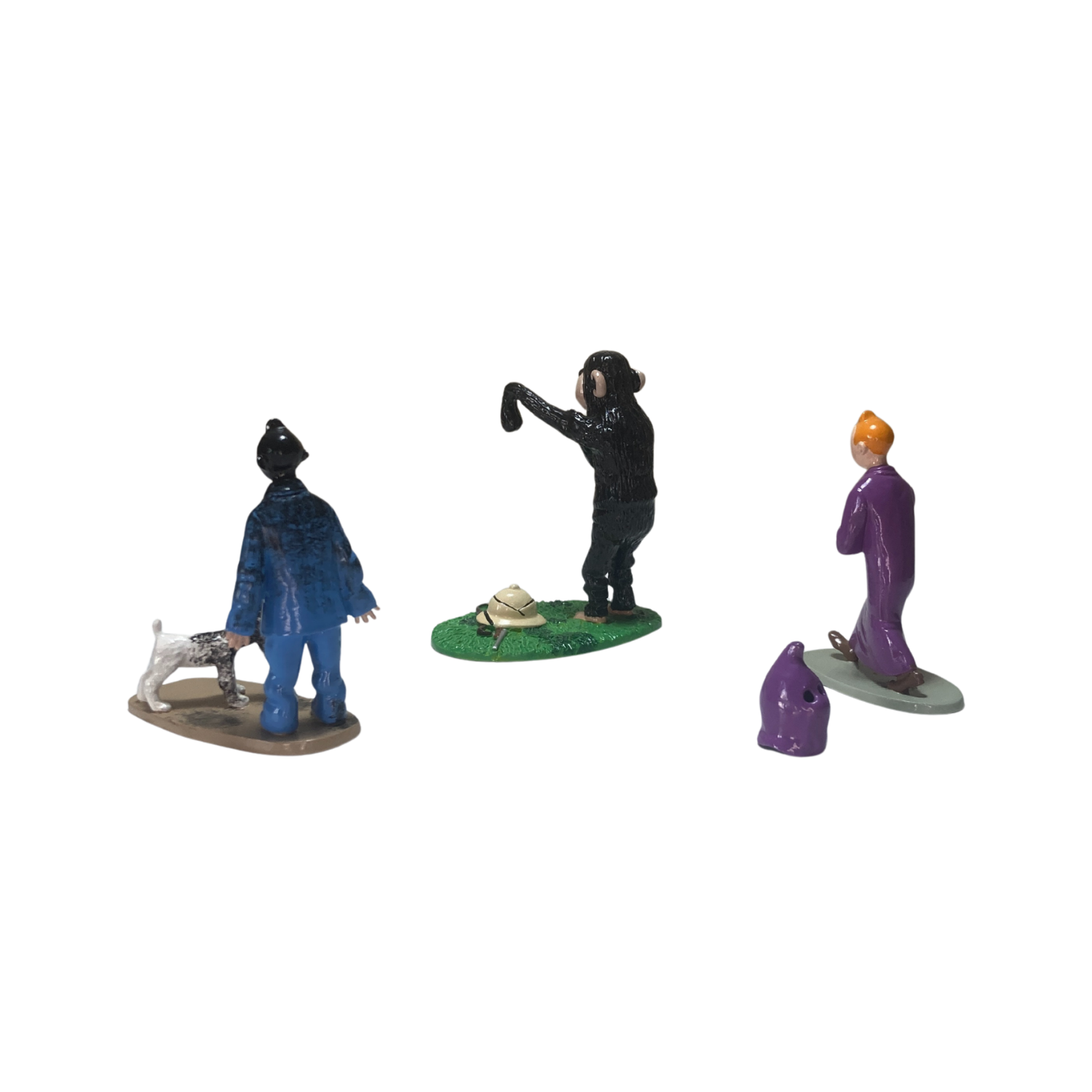 Trio Tintin de Espace714, ensemble de trois figurines ou objets décoratifs inspirés de Tintin, en couleur.
